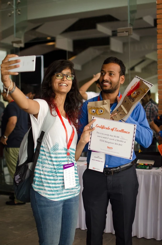 Two participants posing together at the event at All or Nothing.