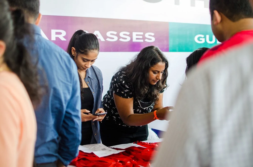 The registration team helping participants at All or Nothing.