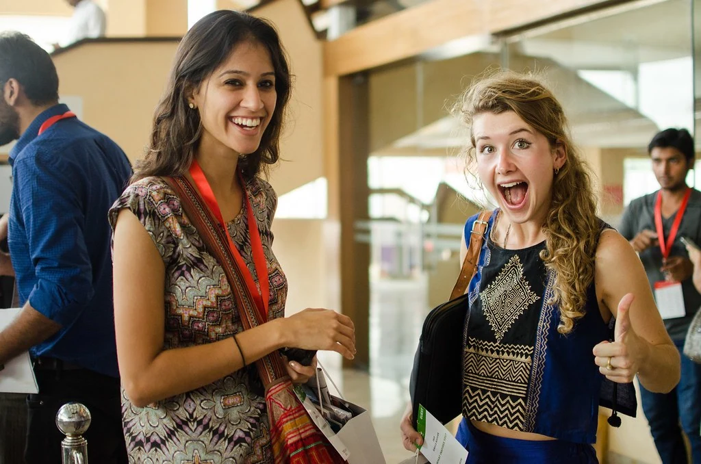 Two participants sharing a laugh at All or Nothing.