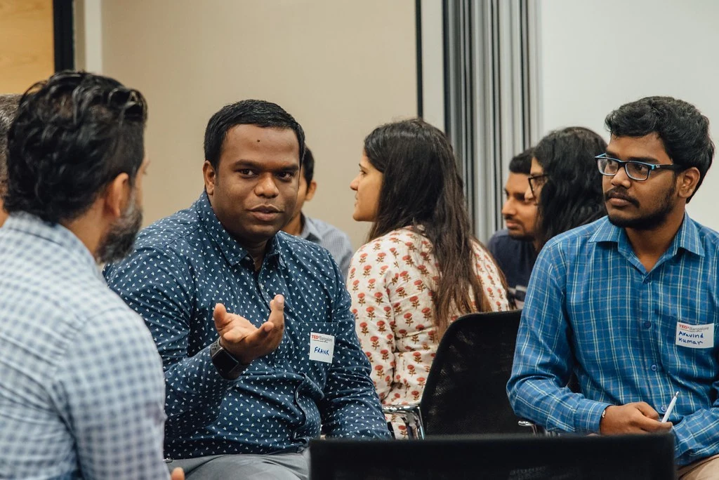 Participants discussing together during The Empathy Workshop.