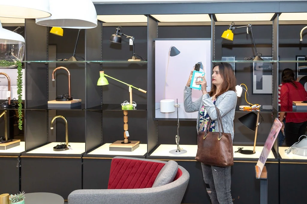 A participant walking through the event space at Nudge.
