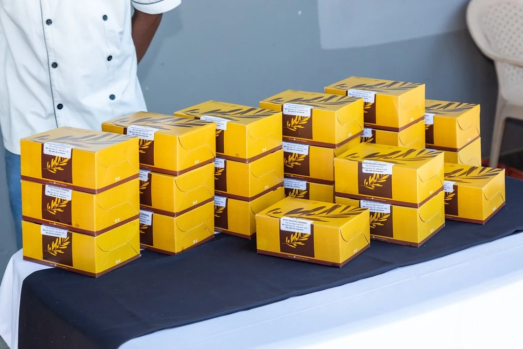 Yellow boxes arranged on a table at Nudge.
