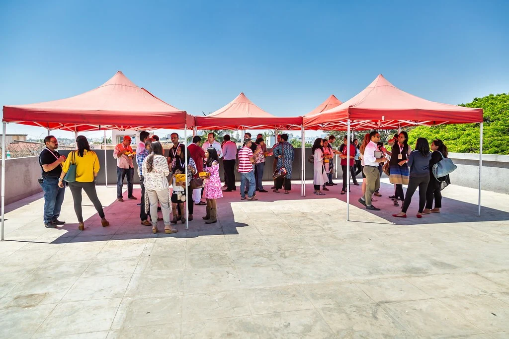 A wide view of the outdoor gathering at Nudge.