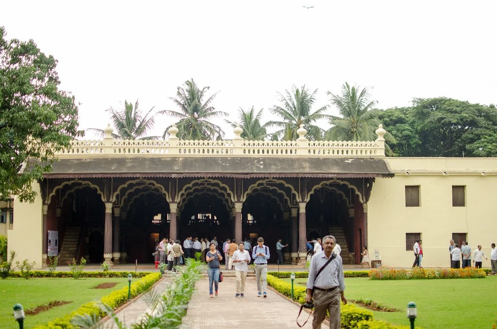 Participants exploring the grounds of a historic building during the 2015 Unconference.