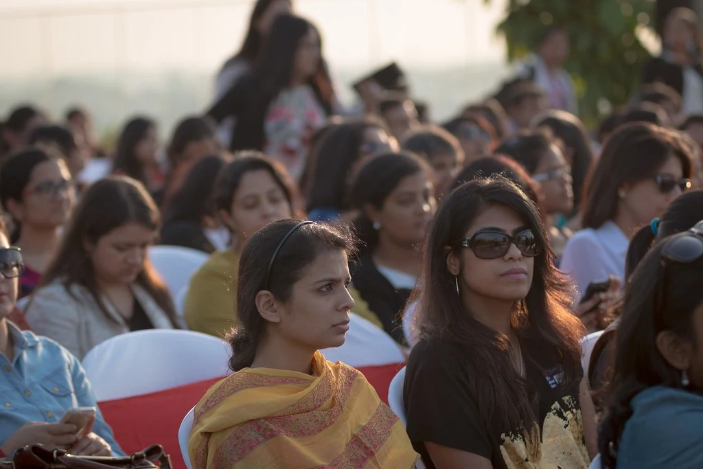 Attendees seated in the outdoor audience at TEDxBangaloreWomen.